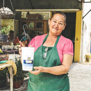Francisca Osuna holds a mosquito kit