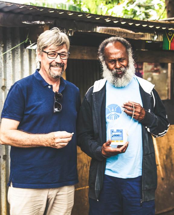 Scott O'Neill and a member of the WMP Vanuatu team
